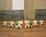 Handmade Rajasthani elephant showpiece set (6 pcs), white & green paper mache figurines for Pooja room decoration or home décor, enhancing the aesthetic value of houses, offices, temples, etc. Ideal for weddings, anniversaries, housewarmings, birthdays, awards, Diwali, festivals, and personal collections. Indian origin