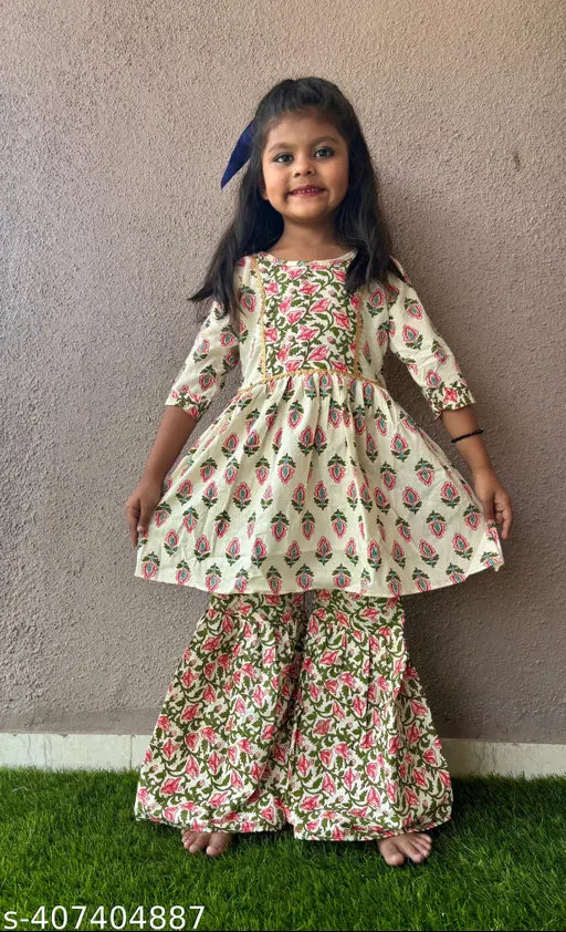 Girls cotton clothing set top & bottom, pack of 1. Printed three-quarter sleeves top and bottom in cotton fabric for girls aged 3-13 years. Made in India