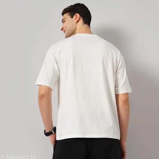 Oversized pure cotton T-shirt in solid color, perfect for modern men's wardrobe. Made in India