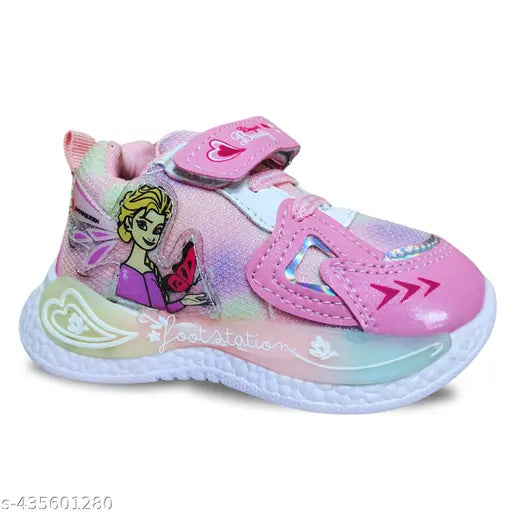 Pink and white child's shoe with cartoon character, adjustable straps, Velcro closures