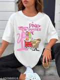 White woman wearing an oversized pink t-shirt with a cartoon illustration of a pink panther holding a pink handbag