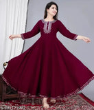 Rayon maroon embroidered three-quarter sleeve gown for women, featuring intricate designs, available in sizes S to XXXL