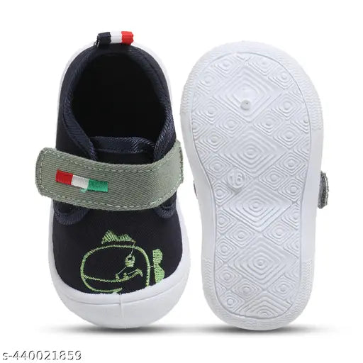 Navy blue canvas casual sneaker shoes for young boys and girls, with flexible soles and mesh panels, suitable for walking and slip-on wear