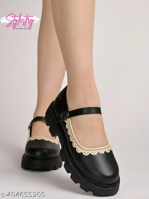 Black synthetic round toe Mary Janes with side buckle & white lace detailing - women's and girls' styles from Stylestry
