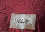 Rose gold, clutch purse with a metal chain strap