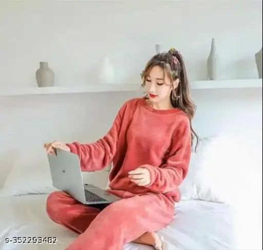 Warm winter nightsuits for women and girls in imported woolen, featuring cute prints and a fur option. Quality-assured Chinese-made pyjamas offering trendy looks and warmth up to 42 inches