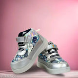 Black, silver, blue kids' shoes with LED lights on the soles