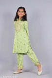Rayon printed kurta and pyjama set for girls, vibrant Indian party wear with frilled hem and three-quarter sleeves, ready to wear for all occasions like weddings or festivals
