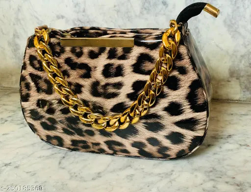 Leopard print designer handbag with gold chain detail