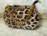 Leopard print designer handbag with gold chain detail