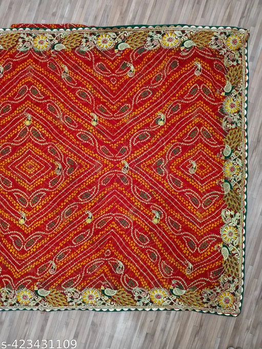 Red bandhani silk saree, embroidered paisley pattern