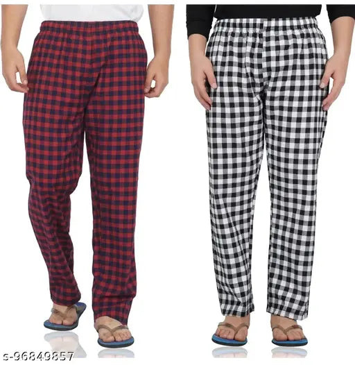 Cotton pyjamas in men's slim fit and women's flared fit, available in red plaid and navy blue plaid