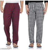 Cotton pyjamas in men's slim fit and women's flared fit, available in red plaid and navy blue plaid