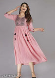 Rayon embroidered flared aline kurta with three-quarter sleeves, Indian festival wear for women on display