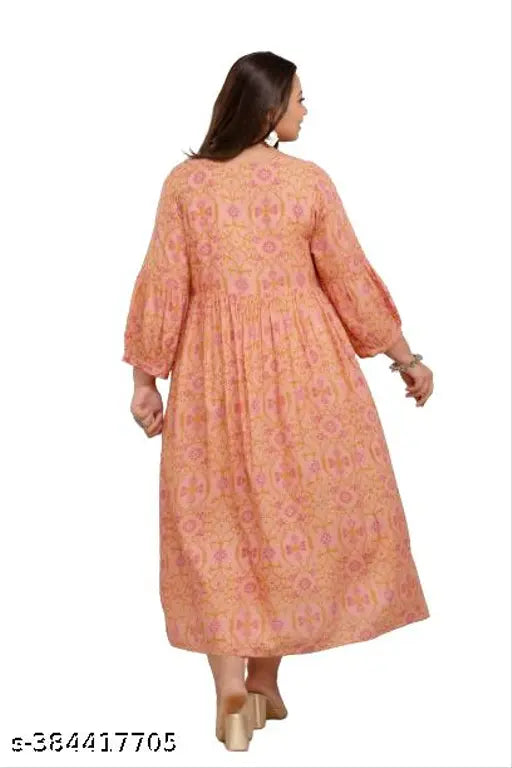 A woman in a long beige dress with no discernible closure or other visible details