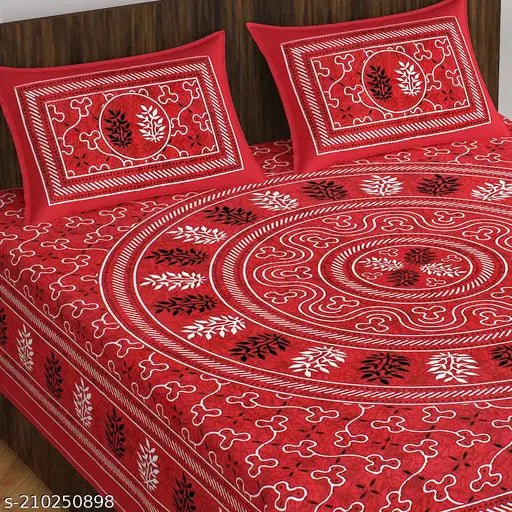 Red cotton double bedsheet with 2 pillow covers, floral pattern, decorative design.
