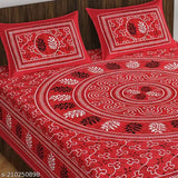 Red cotton double bedsheet with 2 pillow covers, floral pattern, decorative design.
