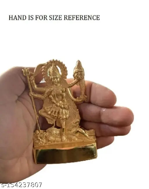 Small golden brass statue of Kali mata, intricate details, 11cm height