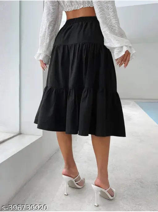 Wide-leg black pleated skirt with ruffled hem, short sleeves, zipper front closure" # color + material + product type