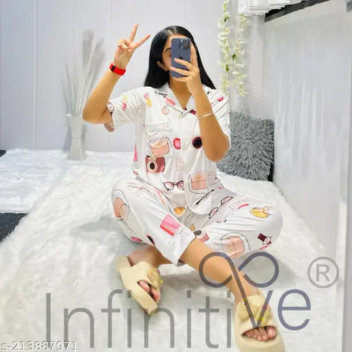 Silk blend quirky night suit combo: shirt, pajama, shorts. Printed design in multiple sizes (M-XXL), suitable for both wear options. Indian-made sleepwear offers soft comfort and luxury