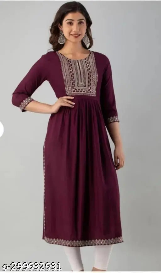Rayon Nayra cut kurti with heavy embroidery, solid color Indian women's fashion with three-quarter sleeves on display