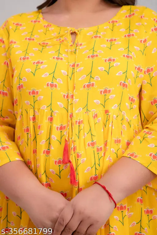 Plus size rayon gown, three-quarter sleeves, printed net design. Beautiful plus size Indian fashion wear." (125 characters)