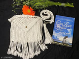 White macramé sling bag with tassels
