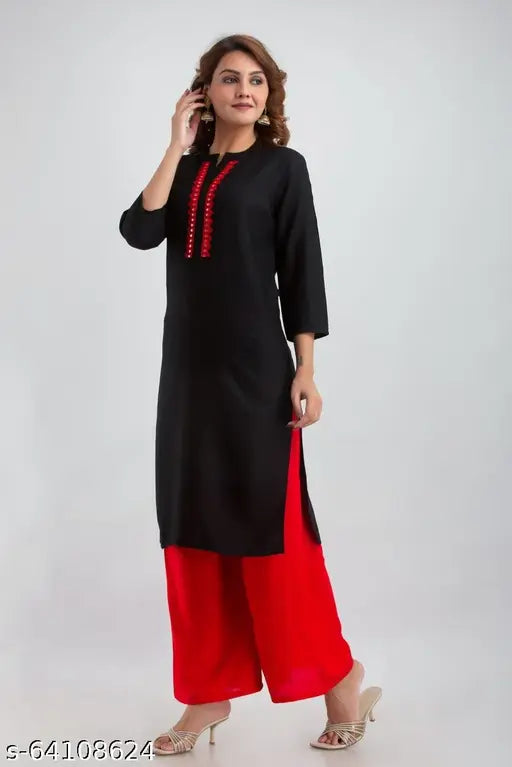 Black rayon kurta with printed net pattern, three-quarter sleeves and red rayon palazzo bottomwear - Indian ethnic wear for women