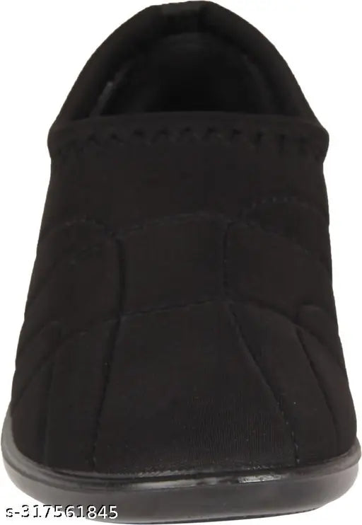 Black synthetic Walkaroo ladies belly shoe, ankle loop design for comfortable support
