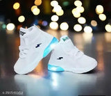 White kids shoes with blue lights and black trim