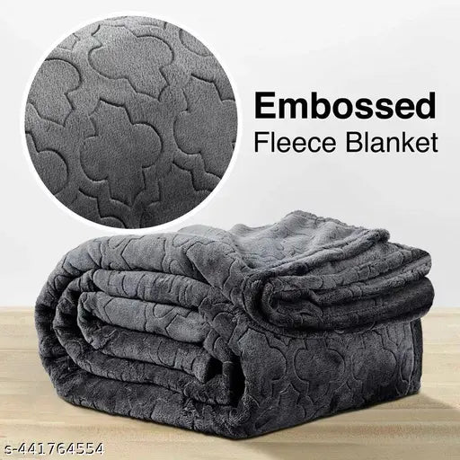 Solid color cotton king size winter blanket Kambal, ideal for heavy winter use, on display
