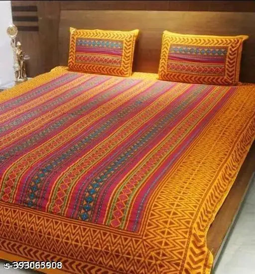 Orange patterned cotton double bedsheet with 2 pillow covers, intricate design.
