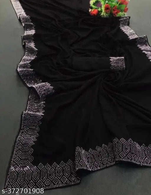 Georgette saree, black, with intricate designs on blouse