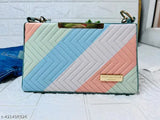 Classic two-tone sling bag, likely cotton or canvas, with adjustable strap and zip closure