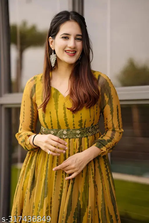 Printed yellow Georgette kurti with three-quarter sleeves, ideal for wedding or partywear. Women's printed Anarkali kurti from CM Cotton Store, made in India