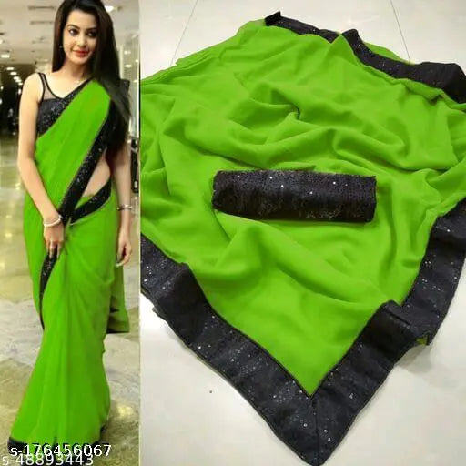 Green georgette saree with lace border and embroidered details, worn by woman at a formal event