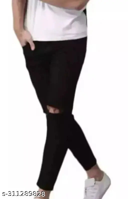 Black cotton blend flaying men knee-slit jeans, ripped net pattern for casual wear (size 28/30/32)