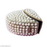 Small pearl clutch purse with multiple compartments and a shiny gold lock