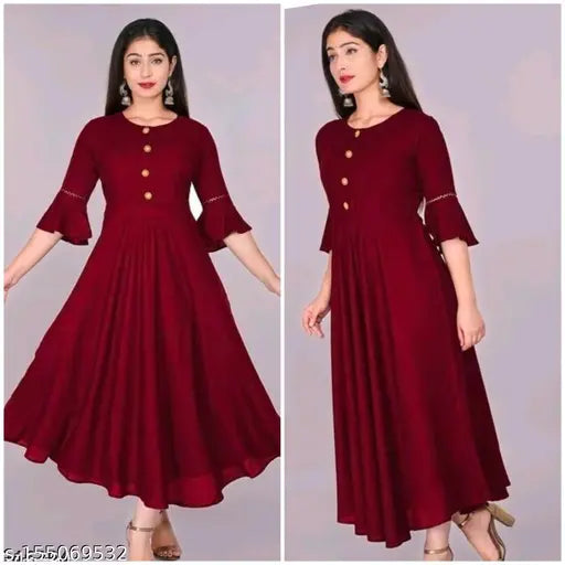 Red kurta with flared sleeves and design details