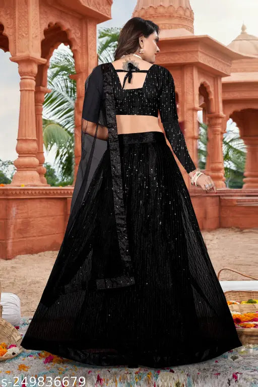 Black net embroidered Lehenga Choli set with blouse & dupatta. Traditional Indian women's outfit featuring intricate embroidery on net fabric, perfect for weddings and celebrations