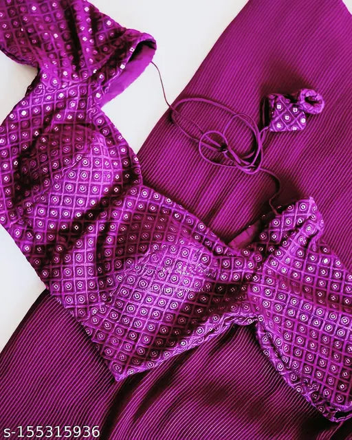 Pink pleated saree with sequin work blouse