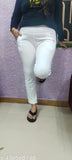 Stylish beige stretchable pants for women, crafted from high-quality Lycra. Ideal for various occasions and sizes, made in India
