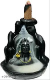 Backflow smoke fountain incense holder, ceramic design with black base and raised image of Lord Shiva, adjustable size for varying incense lengths