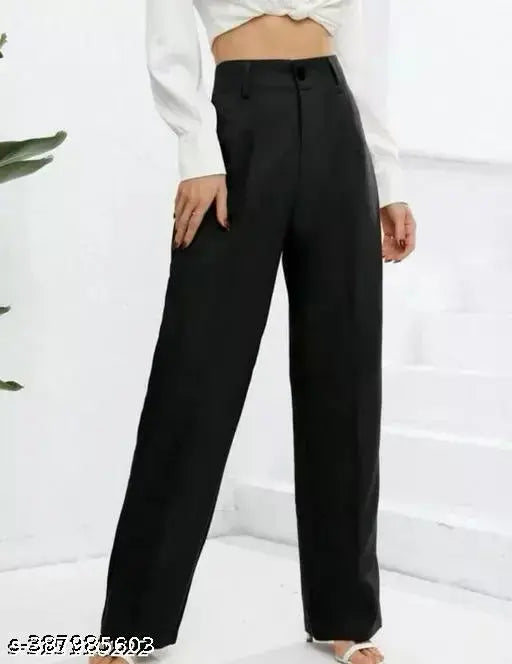 Black jumpsuit with cropped top and flared pants