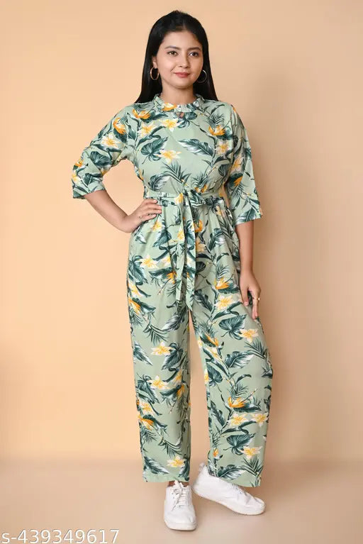 New Rihan Jumpsuit, 100% cotton, printed design, three-quarter sleeves. High-quality stitching, vibrant finish. Women's fashion jumpsuit on display