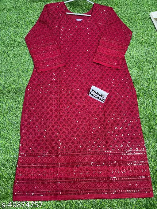Trendy women's cotton Cambric kurta-palazzo sets, embroidered net pattern, three-quarter sleeves. Indian chikankari sequin kurti and palazzos." (123 characters)