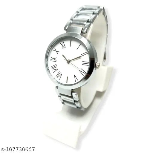Silver watch with black face, Roman numerals, and white hands