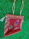 A red paisley handbag with a rope handle