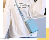 Purple crossbody cell phone bag with double zipper, designed over shoulder, 1 card slot, credit card slots