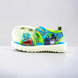 Blue, black, and yellow children's sandal with playful graphics